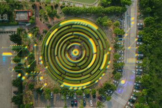 Ey Aerial View Of A Circular Garden Maze And Green Pavilion 17112023.jpg