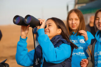 Girl Uses Binoculars.jpg